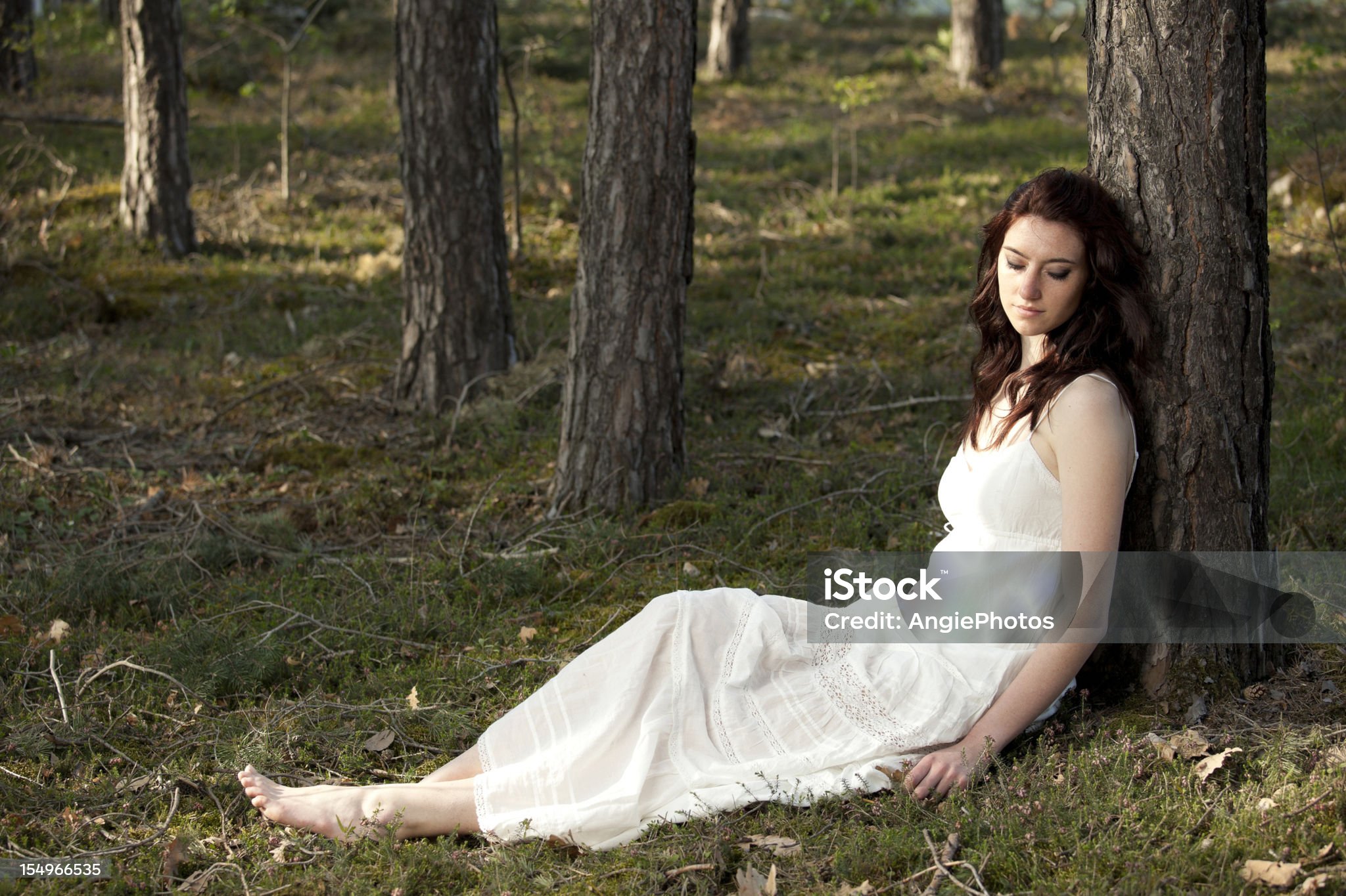 https://media.istockphoto.com/id/154966535/photo/young-woman-relaxing-in-the-forest.jpg?s=2048x2048&amp;w=is&amp;k=20&amp;c=Sf0HtW5VecxGx2CnMkRC5BiTQb9VHr0838zV3CVzKMk=