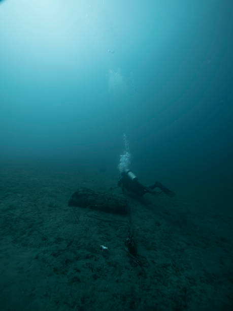 istock Scuba diver explores turquoise ocean depth of Philippines 1549666045