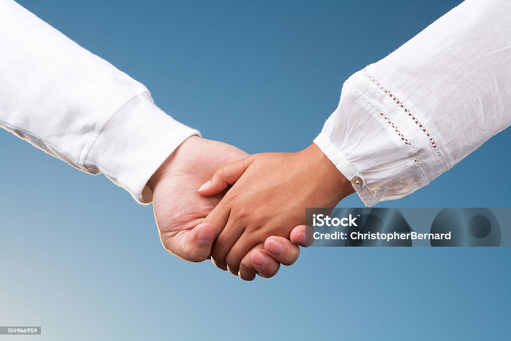 Couple Holding Hands  20-24 Years Stock Photo