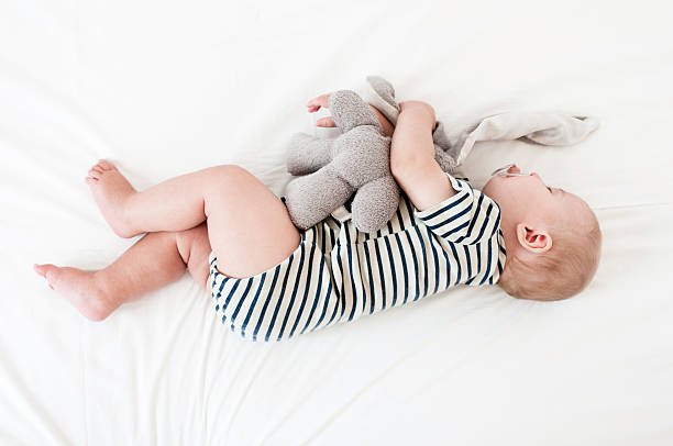 cute bebê menino - stuffed animal imagens e fotografias de stock