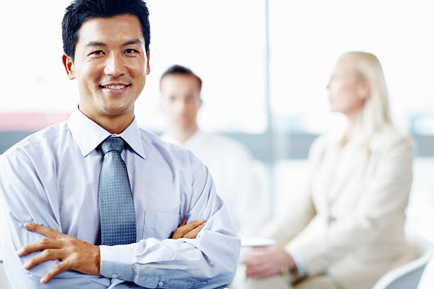 istock Business man with colleague in background 154967308
