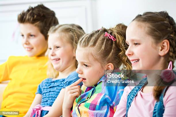 Children Watching Tv Stock Photo - Download Image Now - 6-7 Years, 8-9 Years, Blond Hair