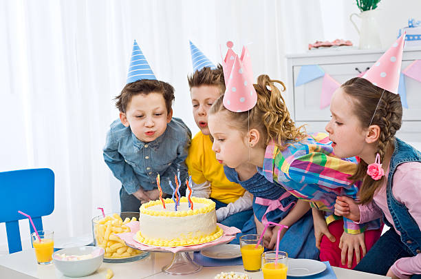 istock Blowing out birthday candles 154968608