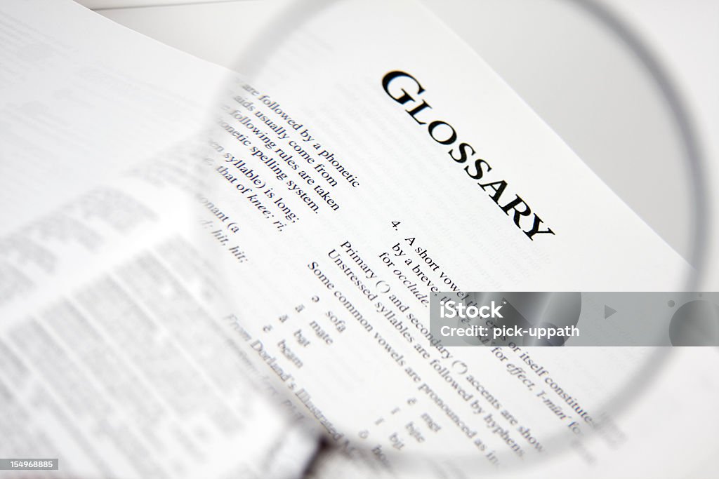 Magnified view of glossary law in a book The word Glossary being magnified. Book Stock Photo