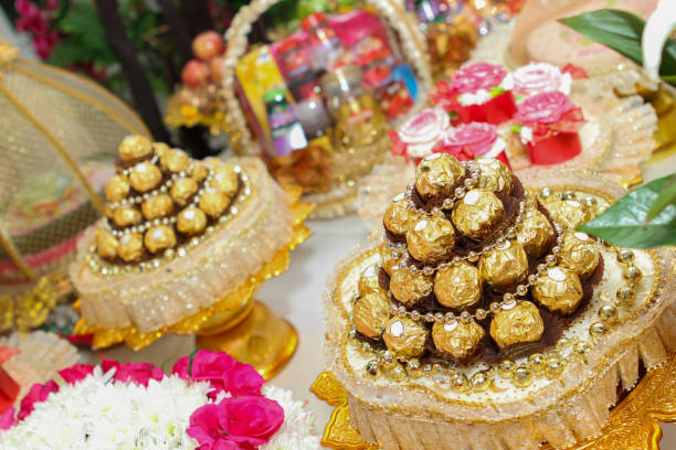 istock Round chocolate wrapped in gold foil. 1549695170