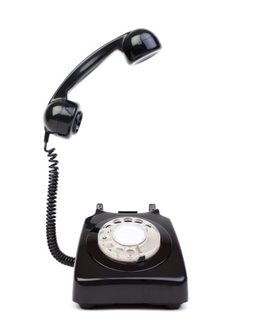 antique telephone on white background,copy space