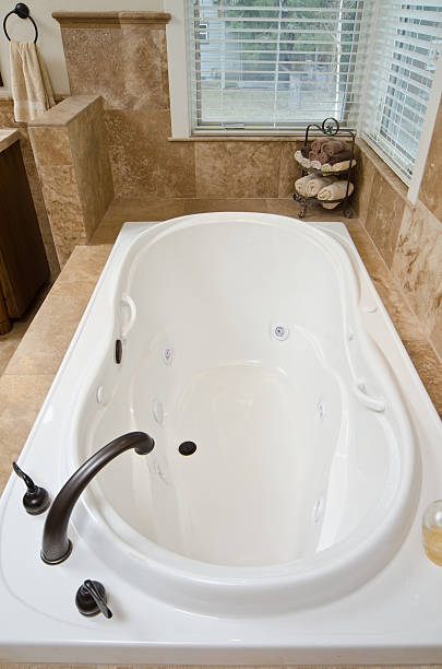 istock Close up of sunken tub with tile 154969946