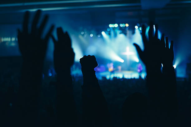 Hands in Worship  place of worship stock pictures, royalty-free photos & images