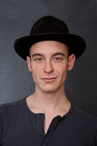 istock Young man with black hat 154970386