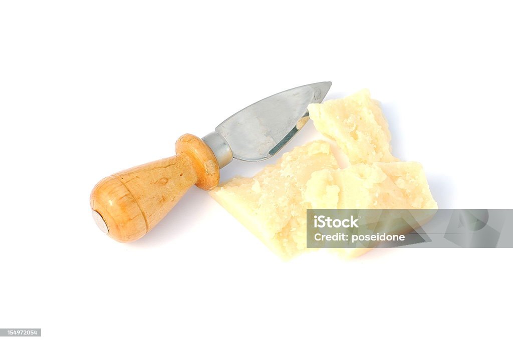 slivers of cheese with knife slivers of cheese with cheese drop knife, on white background soft shadows Appetizer Stock Photo