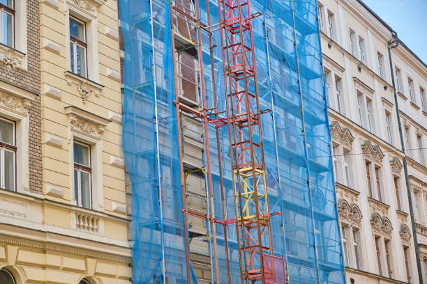 scaffolding Repair of a residential building outside in the city old town city stock photo