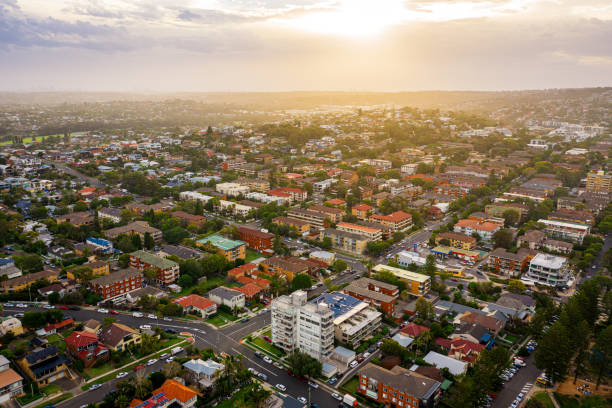 Drone aerial view over suburbs of Northern Beaches Panoramic drone aerial view over suburbs of Northern Beaches Sydney NSW Australia sydney skyline sunset stock pictures, royalty-free photos & images