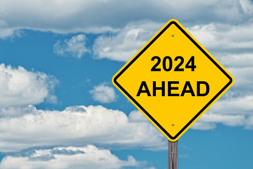 2024 Ahead Caution Sign - Blue Sky Background