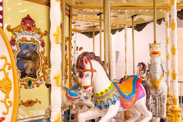 Photo of Graceful Elegance: Exquisite Detail of a White Carousel Horse