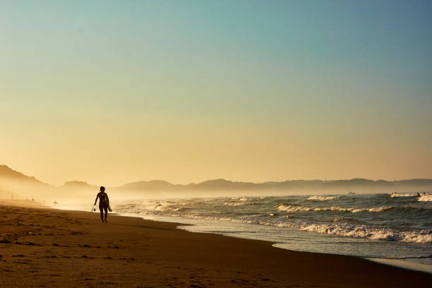 istock Scenic view of beach during sunrise 1549839929
