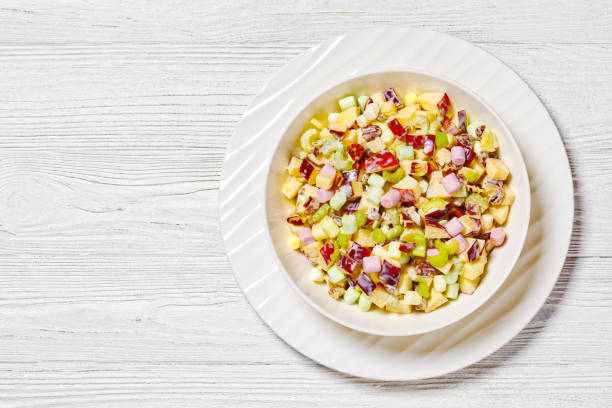 istock Sweet Apple Salad with celery, marshmallows, pecan 1549840369