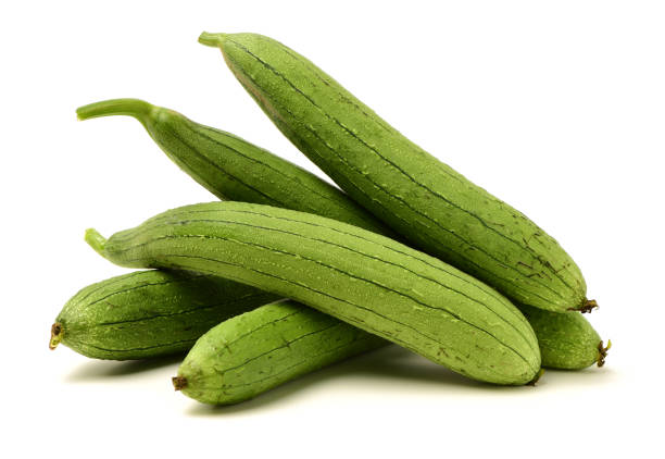 fresh loofah fresh loofah on the white background slate ridge stock pictures, royalty-free photos & images