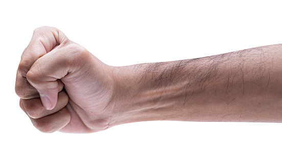 Close up male showing fist hand isolated on a white background  with clipping path