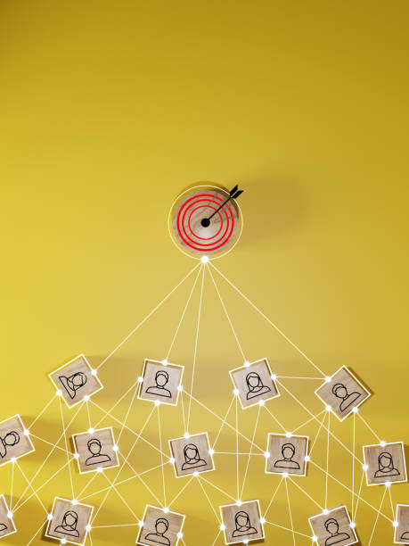 istock Red dartboard and black arrow connection linkage with human icon for customer focus target group and customer relation management concept. 1549856434