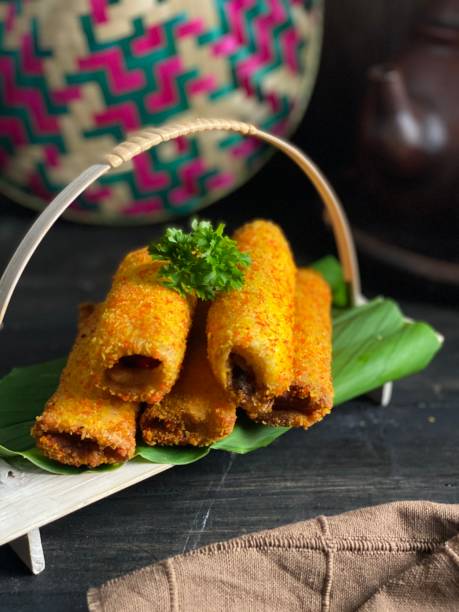 istock sardine roll on a wooden table as a tea time traditional Asian concept 1549903717
