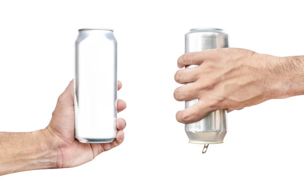 istock Hand hold up and down shiny aluminum can isolated on white background with clipping path 1549904061