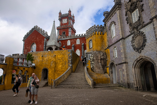 Sintra, Portugal - Pena National Palace on a summer afternoon. This is a very popular spot for tourists.