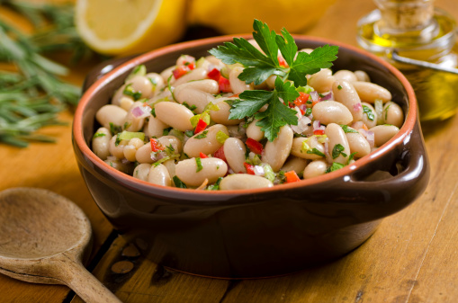 Cannellini white bean salad with olive oil, parsley, and lemon.