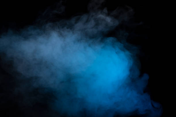 istock Blue and yellow steam on a black background. 1549965149