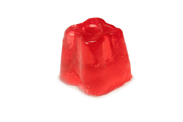 istock Sweet fruit jelly dessert isolated on white background. 1549965185