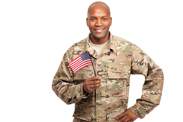 istock Happy serviceman holding an American flag 154998748