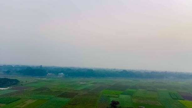 istock Top down drone view of a village agriculture farm. 1550012327