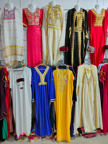 Clothing store full of typical tunisian clothes at La Goulette cruise port.