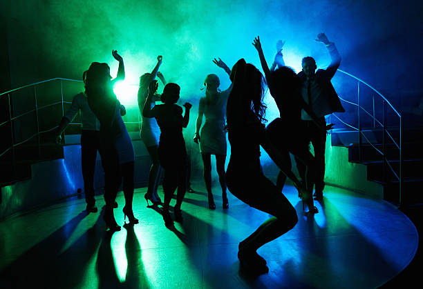 People having fun on dance floor at a night club  dance floor stock pictures, royalty-free photos & images