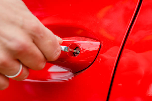 istock Emergency car opening with a traditional key 1550046968