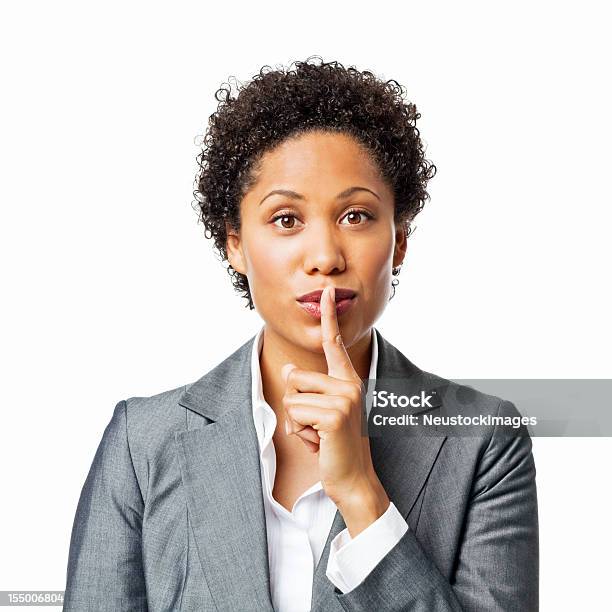 Деловая Женщина Shushing Камеруизолированные — стоковые фотографии и другие картинки Палец на губах - Палец на губах, Костюм, Женщины