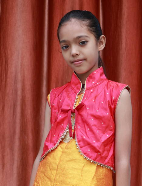 istock An Indian little pretty girl in different poses. 1550072301