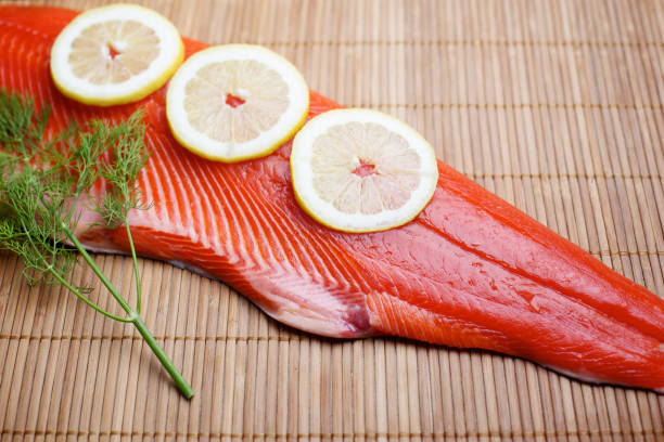 istock Wild Salmon raw fillet on bamboo 155008498