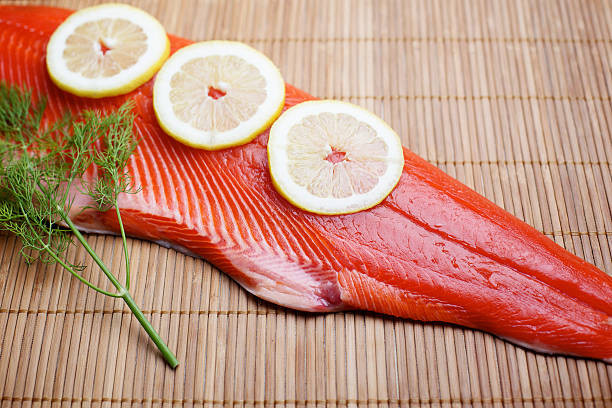 Wild Salmon raw fillet on bamboo  sockeye salmon filet stock pictures, royalty-free photos & images