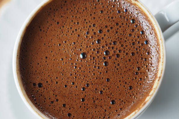 istock top view of hot coffee with bubble on white background 1550099449