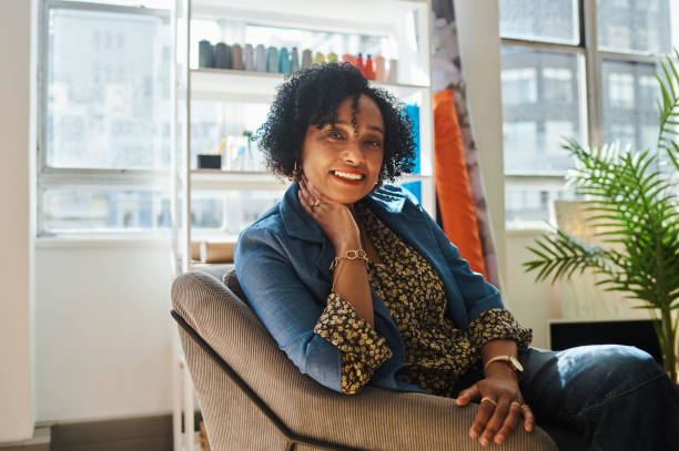 istock Mature designer sitting in her office. Stock photo 1550104355