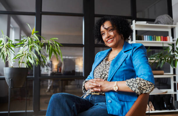 istock Mature creative designer sitting before starting her new project. Stock photo 1550104892