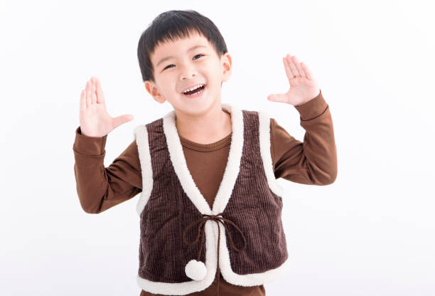 Cute asian little boy playing in the park