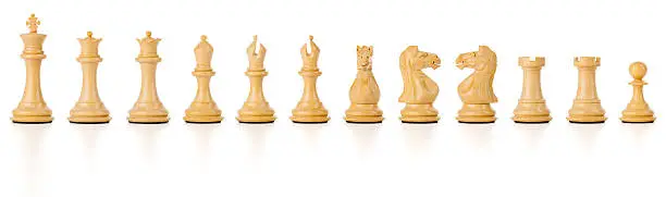 Photo of White Chess Set isolated with clipping path