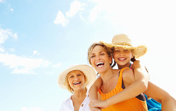 istock Girl enjoying a back ride on mother 155014249