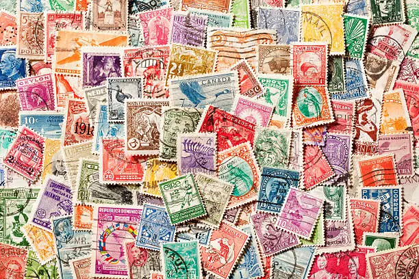 Photo of Background of old, canceled Postage Stamps. XXXL