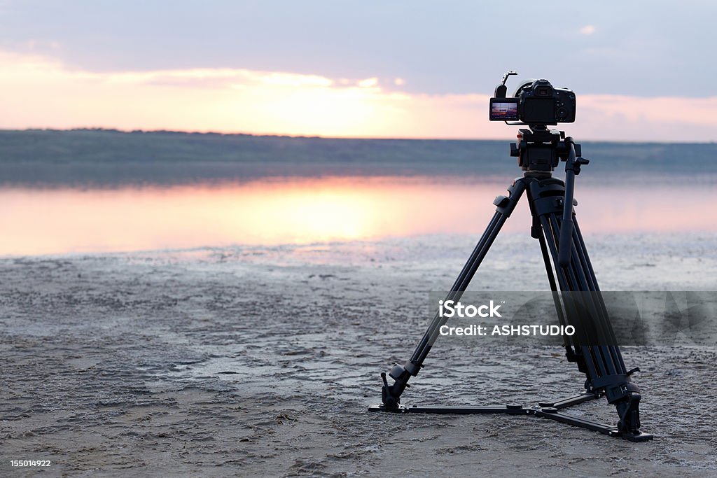Камерой Фо�тографировать на закате - Стоковые фото В полный рост роялти-фри