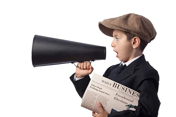 Photo of Newsboy holding Newspaper and Shouting With Megaphone