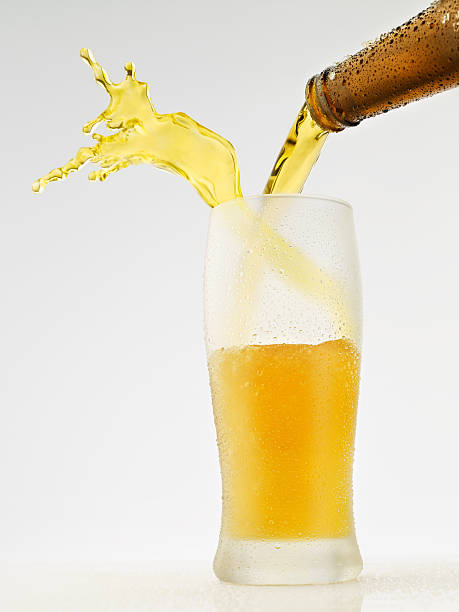 istock Splashing - Beer pour in glass 155016697