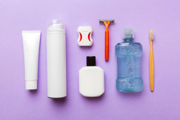 istock Mockup for bathing products top view flat lay, spa razor, toothpaste, soap, gel and other various accessories. Cosmetics for skin health. Bath Mockup for your logo 1550169283