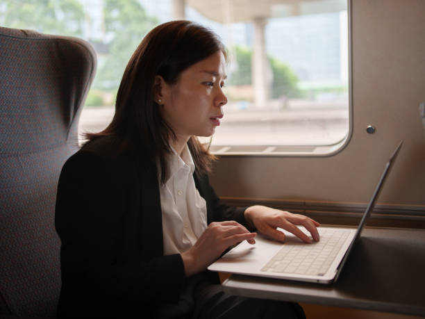 istock Female business people taking trains 1550184815